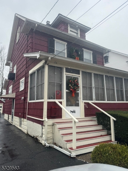 Discover this charming 3 bed-1.5 bath colonial in an unbeatable location just a few blocks from Warinanco Park, a block from the express bus to NYC, and close to the Roselle Park train station and Harrison Elementary School. This well-maintained home offers peace of mind with major upgrades, including a roof completely resheathed and replaced, a sump pump with a French drain system for a dry basement, rewired electric, custom maintenance-free gutter guards, a high-definition security system, a new water heater, and a high-end Utica boiler (2015). Inside, enjoy the warmth of refinished hardwood floors on both levels. The first floor features an enclosed porch, a welcoming living room, a formal dining room, a kitchen with pantry, and a convenient powder room. Upstairs, find three bedrooms, a full bath, and a walk-up attic with finishing potential. Step outside to a spacious, flat backyard and a detached garage " perfect for outdoor fun and additional storage. Don't miss this fantastic opportunity to own a well-cared-for home in a prime location! PHOTOS COMING SOON.