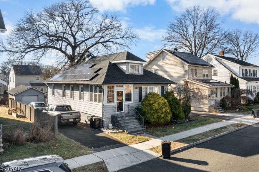 Welcome to this truly special, beautifully maintained 3-bedroom, 2-bathroom home that has been cherished by multiple generations, located in the sought-after Washington neighborhood of Union. Filled with warmth and character, this inviting home seamlessly blends timeless charm with thoughtful updates and a flexible floor plan. Step inside to gleaming hardwood floors, a spacious living room with a cozy fireplace perfect for relaxing evenings, a formal dining room, and two generously sized first-floor bedrooms. The tastefully renovated full bathroom features a large soaking tub, adding comfort and style. The spacious eat-in kitchen offers ample cabinetry and storage, ideal for preparing and enjoying home-cooked meals. Upstairs, you'll find the private primary bedroom with an en-suite bathroom. Throughout the home, authentic details shine with charming built-in storage in the hallways and kitchen with classic sliding barn doors that enhance its character. Enjoy peaceful mornings or evening gatherings on the back deck that overlooks a fully fenced backyard providing privacy and space for outdoor enjoyment. The full finished basement with a wet bar offers a versatile family room perfect for entertaining. Conveniently located near parks, schools, downtown Union, and major roadways including the GSP, Rte 22, and I-78, this home offers the perfect balance of accessibility and community charm. Don't miss the opportunity to own a home in one of Union's most welcoming neighborhoods!