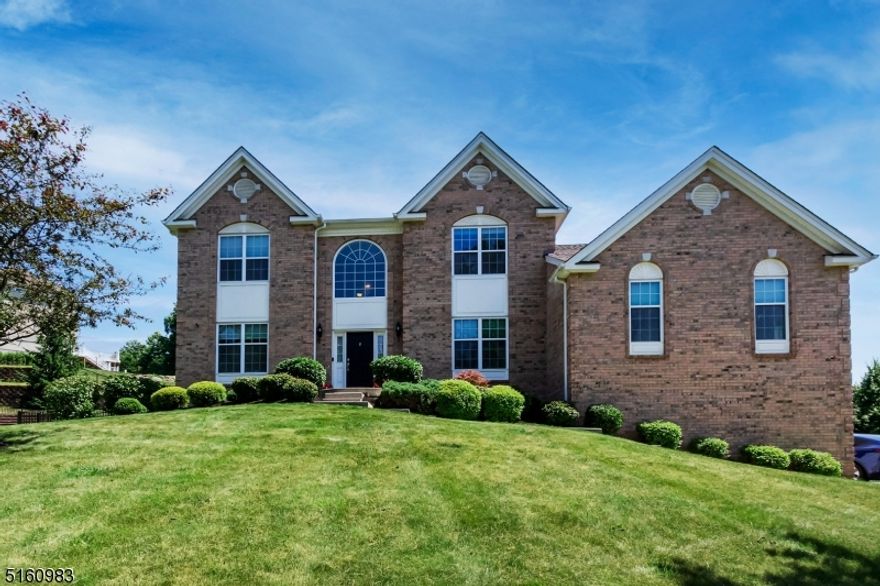 Welcome to this beautiful Everett Model home in the upscale community of "Morris Chase this beautiful, appointed center hall colonial has much to offer.  The gourmet kitchen with large center island, stainless steel appliances, granite counter tops, pantry, and spacious dining area is open to the light and bright family room with vaulted ceiling, fireplace and gorgeous hardwood flooring, leads into an additional great room, perfect for entertaining. The first floor also boasts a formal dining room, living room, first floor bedroom with full bath (ideal in-law suite) laundry room and half bath.  The Master suite is equipped with a full spa like bathroom, enormous walk in closet and separate sitting area. The additional 3 oversized bedrooms all complete with custom closets. Outside of this home is an entertainer's paradise! The expansive paver patio with built in bar is surrounded by professionally landscaped park like property. This Community offers resort style amenities including a clubhouse, fitness center, outdoor pool, tennis, basketball & volleyball. A commuters dream with easy access to major roadways (Rts 287, 202, 80, 46, 10), quality schools, and nearby dining & shopping.