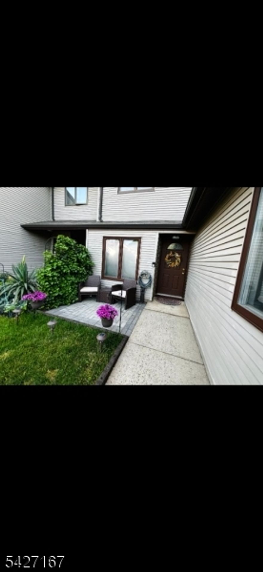 Beautiful 2-bedroom, 2.5-bath townhome offering modern finishes and relaxing outdoor living in the coveted Sunridge community. The main level features hardwood and tile flooring throughout, with a fully renovated kitchen showcasing granite countertops, soft-close cabinets, and all stainless-steel appliances. The open layout flows into the living and dining area, perfect for entertaining. The heated attached garage also provides a dry space to enter and exit the house away from the elements. Upstairs, both bedrooms offer comfort and privacy, both with in suite bathrooms. A convenient half bath makes all the difference on the main floor for guests as well. Some recent work that has been done include a new driveway, front patio, water heater and sump pump for added peace of mind. Kick back and relax on the back patio which includes a hot tub and fire pit to enjoy the nice wooded view. This home speaks for itself.