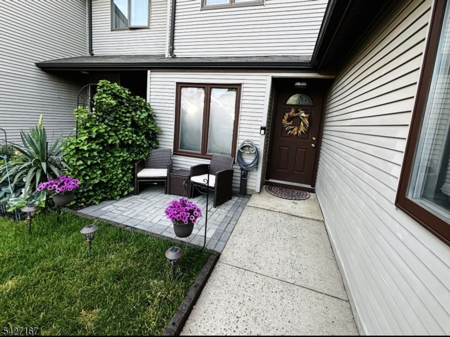 Beautiful 2-bedroom, 2.5-bath townhome offering modern finishes and relaxing outdoor living in the coveted Sunridge community. The main level features hardwood and tile flooring throughout, with a fully renovated kitchen showcasing granite countertops, soft-close cabinets, and all stainless-steel appliances. The open layout flows into the living and dining area, perfect for entertaining. The heated attached garage also provides a dry space to enter and exit the house away from the elements. Upstairs, both bedrooms offer comfort and privacy, both with in suite bathrooms. A convenient half bath makes all the difference on the main floor for guests as well. Some recent work that has been done includes a new driveway, front patio, water heater and sump pump for added peace of mind. Kick back and relax on the back patio which includes a hot tub and fire pit to enjoy the nice wooded view. This home speaks for itself.