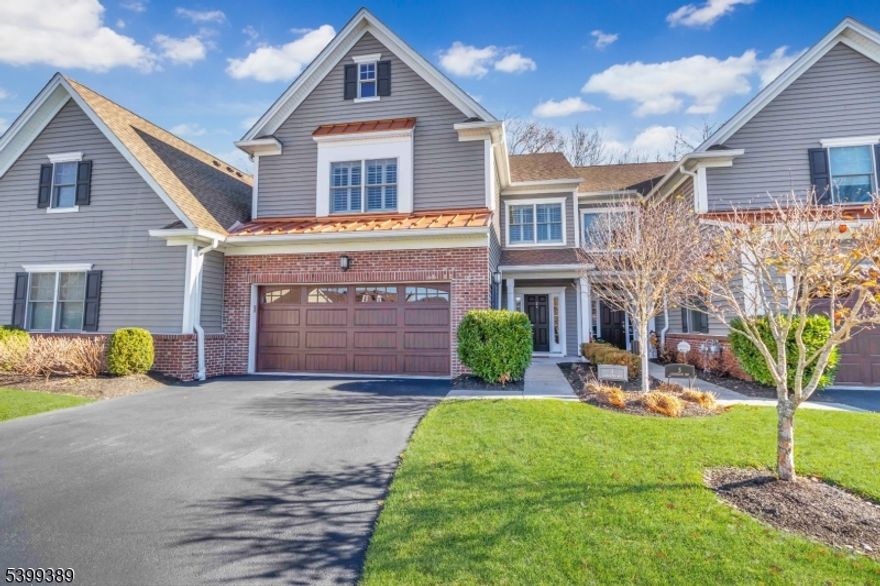 Located in the prestigious James Place community of Morris Township, this stunning Berkshire model offers luxury, comfort, & privacy on a coveted cul-de-sac lot backing to preserved woods. This like-new 3 bedroom, 2.5 bath townhome features an upscale finish package with 9-foot ceilings on both levels, gleaming hardwood floors throughout, crown moldings, & abundant storage. The open-concept first-floor layout is highlighted by a gourmet chef's kitchen with upgraded furniture-quality cabinetry, center island with seating, quartz countertops, under-cabinet lighting, tiled backsplash, walk-in pantry, & KitchenAid Architectural Series stainless appliances, all flowing seamlessly into the dining room that opens to a private deck and sun-filled living room with serene wooded views. A convenient powder room and direct access to the spacious 2-car garage complete the first floor. The 2nd level features a luxurious primary suite with custom-designed walk-in closets, an additional double-door closet, and a spa-like bath with an oversized tiled shower and frameless glass enclosure, while 2 additional sun-drenched bedrooms and a convenient second-level laundry room enhance everyday ease. One of the most private, picturesque settings in James Place, just minutes from downtown Morristown, restaurants, shopping, cultural attractions, Morristown Green, and direct NYC train access a truly exceptional opportunity in one of Morris Township's most sought-after communities.
