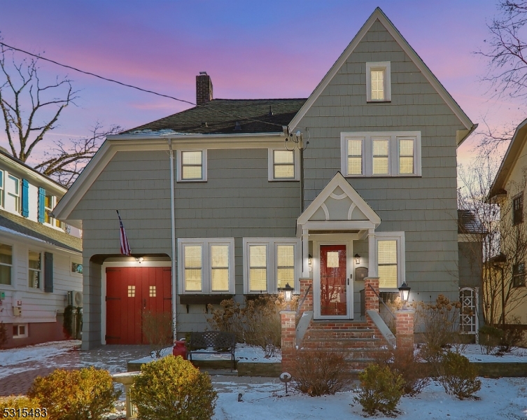 Enchanting, super charming custom built Colonial c.1928 on the river!  A beautiful slate patio opens to the stunning backyard; the perennial gardens were featured in The Garden Club of Cranford's 2023 Garden Tour. Private dock on riverbank; 2 kayaks, & paddle board stay with the house!  Beautiful front door entry to vestibule w/guest closet. High ceilings, oak hardwood floors, & crown molding all add to the ambiance of the main level rooms. The living room boasts a brick fireplace with Excalibur gas insert that can heat the entire 1st floor!  The custom warm white kitchen features stainless Jenn-Air appliances, leather finish granite & glass tile backsplash. The dining room is open to the kitchen. The family room faces the river with a wall of windows. The 2nd floor boasts a generous primary suite (20 x 19) with dressing area, closets and spa bath (2022).  Two additional BR's and main bath w/linen closet. Walk-up to 3rd floor to 4th BR or office/studio. Large storage room adjacent. Two zone gas heat & CAC. Finished playroom in basement as well as laundry & storage. One car over-sized garage.  Flood zone A; insurance required. Just minutes to Dreyer Farms, McConnell Park, Cranford Canoe Club, Hanson Park and spectacular Downtown Cranford w/specialty shops, movie theater, art gallery, fabulous restaurants, bistros, & pubs. NYC transportation both rail & bus w/several one-seat rides every day!