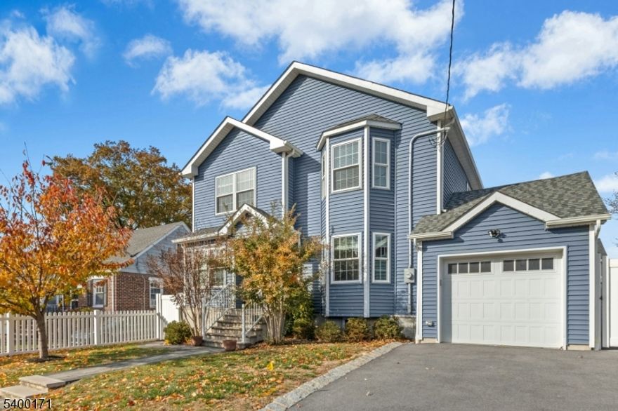 Located in the desirable Washington School Section, just moments from the 5 Points area, this beautifully renovated 2019 home offers modern comfort and exceptional space. Step inside to an impressive open floor plan featuring a spacious living room with a gas fireplace, and a formal dining room that flows seamlessly into the designer kitchen. The kitchen boasts a center island, high-end cabinetry, quartz countertops, and a farmhouse sink, modern SS appliance, refrigerator, dishwasher, microwave, pantry. A private home office, and a powder room. Sliding doors off the kitchen open to a small landing overlooking a stunning backyard retreat with a large paver patio perfect for dining, entertaining, and relaxing. The 2nd floor features a luxurious primary suite with an expansive walk-in closet and a stunning bathroom complete with a soaking tub. Three additional bedrooms, a main bath, and a laundry closet complete this level. The fully finished basement adds even more living space with a recreation room, office/bedroom, full bath, storage room, utility room, and walkout access. Sparkling hardwood floors run throughout the home, adding warmth and elegance to every level.