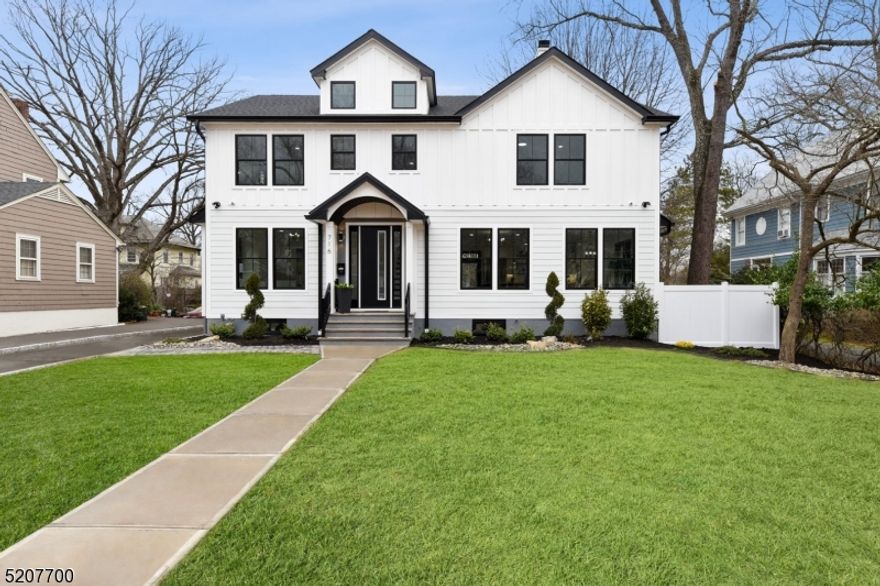 COMPLETE RENOVATION and ADDITION! This spectacular home is loaded with CONTEMPORARY designer features and CUSTOM finishes throughout. No expense has been spared in this masterpiece! Boasting a Chef's EIK w/Fabuwood soft-close wood cabinetry, large island w/built-in microwave and waterfall Calacatta ultra quartz counters, high-end stainless steel appliances & tile backsplash. The kitchen flows into the formal dining room and sitting room that features a fireplace & wet bar w/wine fridge. A spacious family room, bedroom with an ensuite bathroom (or home office) and a powder room complete this level. Upstairs, you'll find four more bedrooms quietly tucked away. The primary suite includes CUSTOM WIC's and a spa-like bath with a soaking tub and stall shower. The fully finished lower level includes a large recreation room w/wet bar & another full bath. The majority of the home is NEWLY framed, has 9 foot ceilings & crown moldings on the 1st floor and gets tons of natural light. This AMAZING home also features ALL NEW: HardiePlank siding, Timberline roof, windows, plumbing & electric, baths w/premium tile & CUSTOM shower doors, 2-zone HVAC, tankless hot water heater, built-in indoor & outdoor speakers, NEST thermostats, oak hardwood floors throughout, Masonite solid wood doors, built-in organizers in all closets, NEWLY paved driveway, 6' vinyl privacy fence, paver patio, gas line for grill & much more! Conveniently located to top-rated schools, parks, downtown Westfield & NYC train.