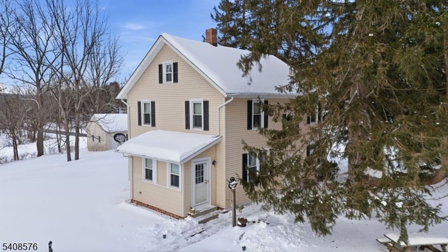 Welcome to 203 Johnsonburg Road, a classic 1916 Sears Albion two-story home filled with historic charm. This 4-bedroom, 1.5-bath residence features original hardwood floors, a newer roof, and vinyl siding for peace of mind. Step inside through the inviting three-season room and enjoy timeless details throughout. Set on a 1.5-acre park-like property, this home offers exceptional outdoor amenities including a large three-car garage/workshop, an attached barn with two-stall paddock, and a tack room below ideal for a small hobby farm or equestrian enthusiast. An additional detached oversized one-car garage provides even more storage or workspace. Conveniently located just minutes from Route 80, this unique property blends rural charm with easy access to major routes.