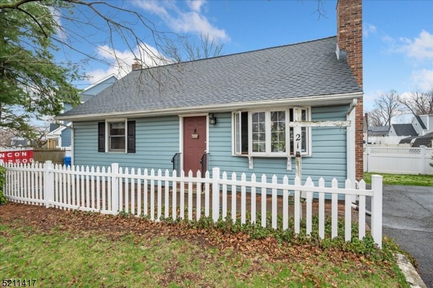 Beautifully Maintained Cape in a Lovely Residential Neighborhood!  Move-in ready gem set on a quiet tree-lined street complete with white picket fence, abundant curb appeal, and backyard with an in-ground pool. There's room for everyone with 3 bedrooms, 2 full baths and a full basement with plenty storage space, recreation room and a dry bar. The main floor opens with a welcoming living room featuring a sunny bay window and charming wood-burning stove flanked by built-in shelving. Next is a gorgeous eat-in kitchen, boasting stainless steel appliances, classic white cabinetry, subway tile backsplash,  and recessed lighting. A family room offers a cozy space for relaxing with barn doors that open to a main-floor bedroom that's ideal as an office or for guests. A full bath with tub/shower combo is down the hall. Two big bedrooms can be found upstairs, along with a second full hall bath with shower. A side entry off the kitchen leads to a fully fenced backyard just waiting to host your warm-weather gatherings, including a patio, mature landscaping, and a sparkling in-ground pool for cooling off.  Numerous features including renovated kitchen and baths, pine flooring, custom oak millwork, energy efficient smart thermostats, and new heater and filter/pump for the pool. Great location near shopping, dining, schools, and highways.