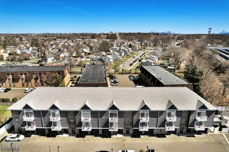 Investors - Stunning 18 unit luxury apartment building, constructed in 2016.  This meticulously designed property features 17 spacious 2 bedroom/2 bath units with open floor plans.   The first-floor units come with attached garages with unit access, private patios.   The seven second floor units each 1,100 sq ft, offer open concept layouts with balconies.  The seven third floor units feature expansive 1,500 st. ft. floor plans with lofts and private balconies.  All units offer hardwood floor, w/d in unit, SS appliances including dishwasher/microwave and central air. Close proximity to major highways, downtown Montlclair, train.   Separate utilities, 2 parking spots available for each unit.