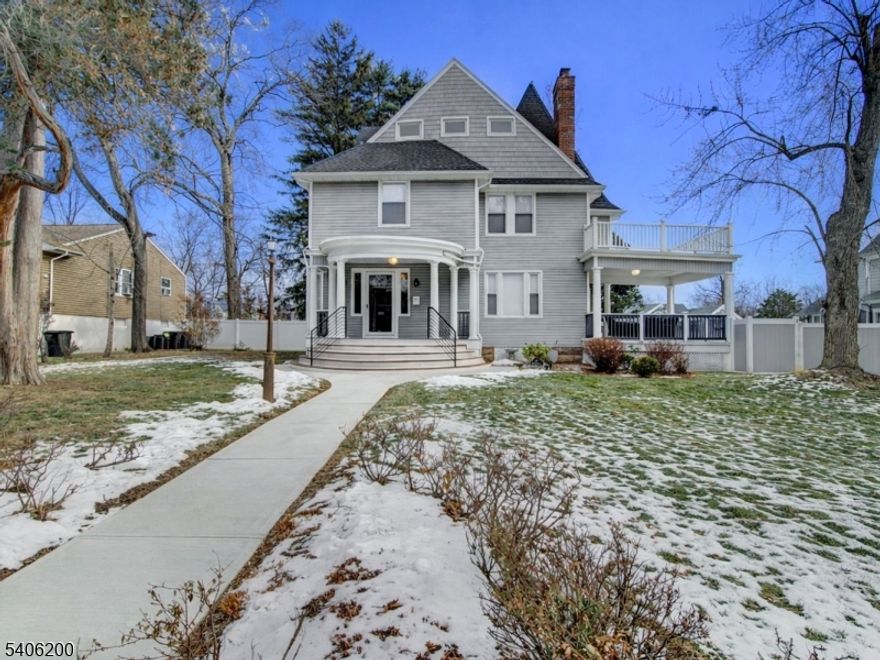 Welcome to a truly exceptional residence nestled in the heart of Seven Oaks, Orange's prestigious Historic District. This luxury colonial showcases striking curb appeal and refined architectural elegance. A grand foyer welcomes you, highlighted by a breathtaking center-piece leaded stained glass window that bathes the home in natural light and creates an unforgettable first impression. Fully renovated in 2019, this stately home offers 6 bedrooms, 3.5 baths, and a 2-car garage, which seamlessly blends classic architectural charm with refined living, offering space, grace, and distinction at every turn. The expansive living and dining areas flow effortlessly, creating an inviting atmosphere for holding memorable gatherings, while the generously sized bedrooms provide private retreats for peace and comfort. The primary suite is a true sanctuary, offering tranquility in a setting worthy of the home's stature. Step outside to a private enclosed backyard, an oasis perfect for entertaining or quiet moments of relaxation. Ideally located just minutes from various NYC train stations, this home delivers the rare combination of timeless elegance, modern comfort, and effortless commuter access. This is more than a home - it's a statement!Don't miss this exceptional opportunity- schedule your showing today. Luxury. Legacy. Location!