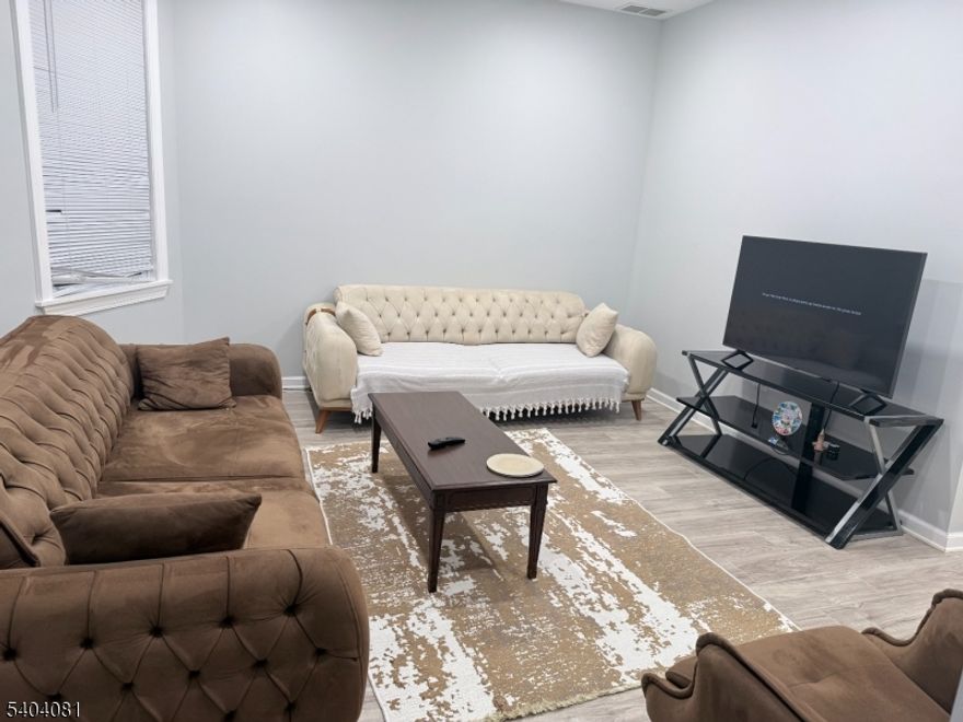 Completely renovated 2nd floor plus attic. 2nd floor has 3 bedrooms, Living room, Dinning Room, Kitchen , full bath, plus large finished open space attic. Laundry hookups in Basement. shared use of back yard . street Parking only.