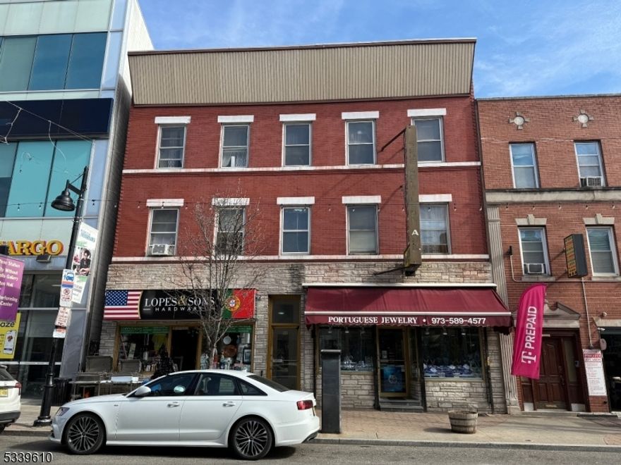 Ironbound - 10 Apartments and 2 Retail Stores (Hardware & Jewelry Store) - Value Add Investment Property Featuring 3 - 1 Bedroom Apartments and 7 - 2 Bedroom (Rail Road Style) Apartments. All Residential Apartments are Below Market Value and Subject to Rent Control. All Tenants are Month to Month. Owner pays for Heat (Oil) and Hot Water for Entire Building.  Three Story Building w/ Approximately 8,664 Sq. Ft. Built Around 1940 and Zoned C-2. Centrally Located and Minutes By Foot to Penn Station.