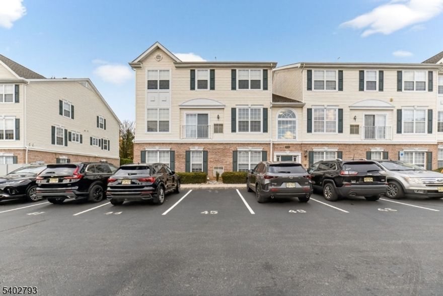 Welcome Home to this stunning Coventry end unit! This beautifully updated home features new floors throughout. The open-concept layout showcases abundant natural light and includes a spacious living room, modern kitchen with stainless steel appliances and breakfast nook, and a formal dining area with French doors leading to the sunroom. You?ll also find a convenient laundry area with a newer washer & dryer, and half bath on the main level. The impressive two-story foyer leads to the upper level, which offers a versatile loft, a luxurious primary suite with an attached sitting or exercise room, two walk-in closets, and a private ensuite bath. An additional bedroom and full bath complete the second floor. Extra perks include a dedicated parking spot, blinds, dedicated storage area in the basement and access to community amenities such as a clubhouse, fitness center, outdoor pool, community garden, dog run, gazebo, playgrounds, and basketball and tennis courts?and much more!