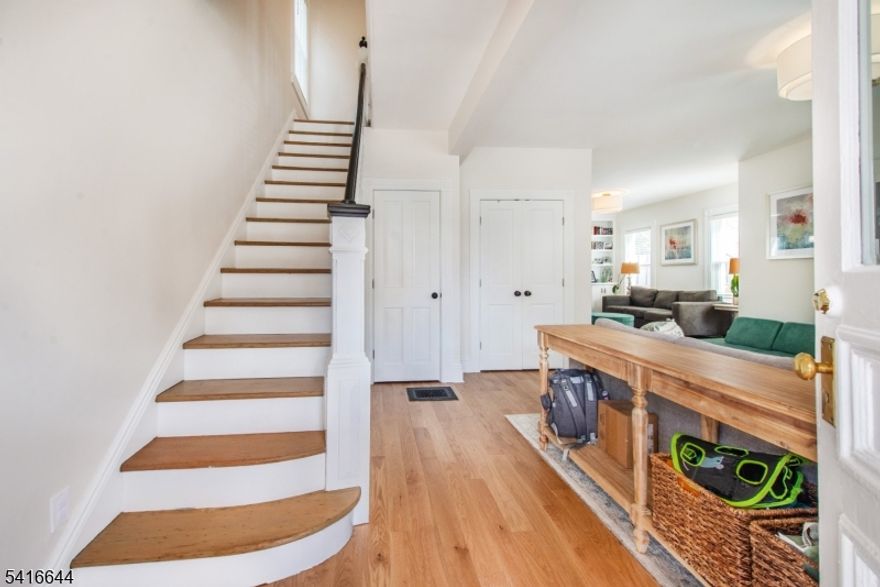 Stunning 5-bedroom, 2.5-bath Victorian in the heart of Rahway, just moments from Midtown Direct train access, downtown restaurants, and the Union County Performing Arts Center. Thoughtfully renovated with respect for the home's historic character, this property blends timeless architecture with modern updates. An inviting foyer welcomes you with the original newel post, storage under the stairs, a powder room, and large coat closet. The formal living room features an original mantel, detailed window casings, and abundant natural light. The family room includes custom built-ins and another original mantel and flows into the formal dining room, perfect for entertaining.The beautifully renovated eat-in kitchen is the showpiece of the home, featuring high-end appliances, custom cabinetry, quartz countertops, a center island, pantry, coffee bar, and meticulously restored beadboard ceiling. French doors off the kitchen lead to the laundry room and provide access to the unfinished basement.The second floor offers four bedrooms with charming architectural details including arches and original corbels. Three bedrooms share a newly renovated full bath, while the primary suite includes a large closet and private bath with dual sinks and stall shower. The third floor features an additional bedroom and large unfinished attic with endless potential.Newer utilities (cen. AC on 2nd+3rd fl) siding, and roof. Large fenced yard. A rare opportunity in one of Rahway's most desirable locations.