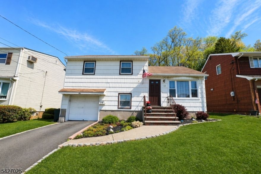 Spacious split-level home offering a bright living room, formal dining room with sliding doors leading to a deck, and a well-appointed kitchen. The home also features a comfortable family room, three bedrooms, and 1.5 bathrooms. A walk-up attic provides flexible space ideal for a home office or additional storage, while the partially finished basement adds even more versatility. Recent upgrades include a newer furnace, central air conditioning, and hot water heater. Complete with a one-car garage, this home is conveniently located near parks, major highways, and transportation to NYC.  Highest and Best Offer due by Friday by 12pm.