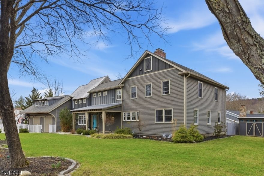 Gorgeous custom home in the perfect location for easy access to all that Mendham Boro has to offer! Updated top to bottom with so many custom features and highlights! Wood flooring, reclaimed wood accents, moldings and barn doors, chef's kitchen with large center island, breakfast bar and high-end stainless appliances, including wine refrigerator and Quartz counter tops. Soaring ceilings with plenty of windows for natural light and feeling of openness. Professionally landscaped. Features include open concept floor plan, wood burning fireplace, Juliette balcony, radiant heat, recessed lighting, 1st floor office, can also be a playroom, with adjacent full bath; finished garage with epoxy flooring, mudroom with cubby storage area, 2nd floor loft overlooking family room; Master suite with full Master bathroom, plus 3 generously sized bedrooms, and 2 additional full baths on 2nd floor; basement with full bath and ample storage and access to backyard through Bilco doors. Backyard is fully fenced with vinyl fencing, deck with pergola, waterproof shed, professionally landscaped yard. Short drive to NJ Transit train, excellent schools and West Morris Mendham High School with IB Program. Acreage per survey/Homeowner; Central vac as-is; EXCLUSIONS:  master bedroom closet chandelier, mudroom mirror, wall desk, water filter system, window treatments but the rods will stay, wall shelf in the living room, living room art and light.