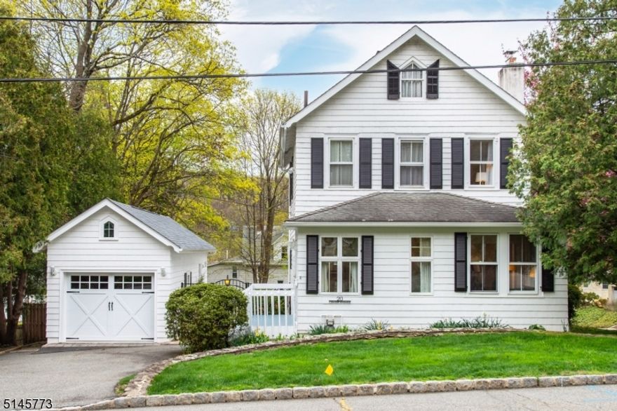 Picture perfect and updated 1880s colonial with three bedrooms and two and a half baths. Exceptional location on a quiet street, yet walking distance to town. The property offers a large beautifully landscaped fenced yard, bluestone patio, new oversized detached garage and quaint garden shed. The home oozes of charm without neglecting modern taste. The main level offers a living room with wood-burning fireplace and attached nook great for library, office or music space, a bedroom (currently being used as a den and office), half bath, kitchen and dining room. The primary bedroom upstairs has a hallway of closets and large ensuite bathroom with double vanity. A second bedroom and another full bath complete the second floor. The basement has laundry and several additional storage areas. Tons of natural light, beautiful hardwood floors, details galore - make this your quiet retreat close to all Morristown has to offer. Highest and best offers due by Tuesday, May 3rd by 5 p.m.