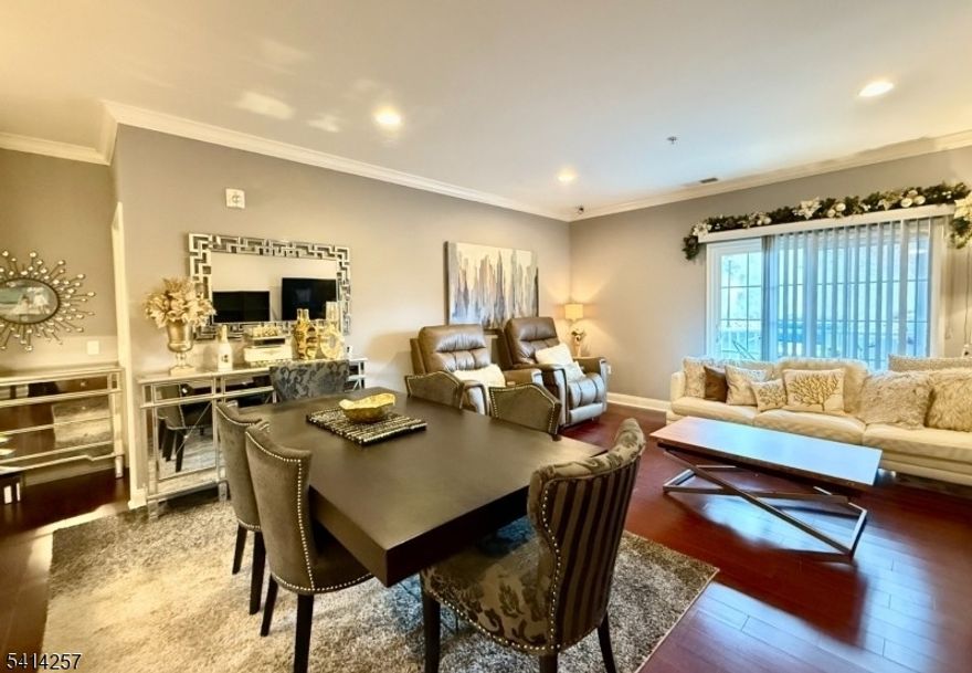 LIVE THE GRANDE LIFE!  Available Immediately! Magnolia Model with 1,447 s.f. of elegant living space - all on one floor! This exceptional condo offers the perfect blend of comfort and style. As you enter, you will be greeted by an expansive kitchen featuring ample cabinetry and generous counter space, complemented by a convenient breakfast bar ideal for casual dining or entertaining. The large dining & living areas create a warm and inviting atmosphere, perfect for both relaxation and hosting gatherings. The primary bedroom suite is truly a standout, boasting a spacious WIC along with an additional wall of custom closets. The primary bathroom enhances the suite with a double sink vanity, walk-in shower & additional closet space. Additional features include wood flooring, laundry in unit, balcony & much more! This unit is a must see for anyone seeking a spacious first-floor living experience. Enjoy all the amenities the Grande has to offer, 2 swimming pools, 2 club houses, billiards rooms, tennis courts, fitness centers, conference rooms, party rooms. Close to major highways, shopping, restaurants and much more!  Assigned parking in garage. Add'l parking outside. Required lease application, credit check, employment verif. Credit score 700+.   $400 Grande move in fee & $750 refundable sec dep. NO SMOKING OR VAPING IN CONDO OR BALCONY. NO PETS. Tenant responsible for the first $150 of any repair.