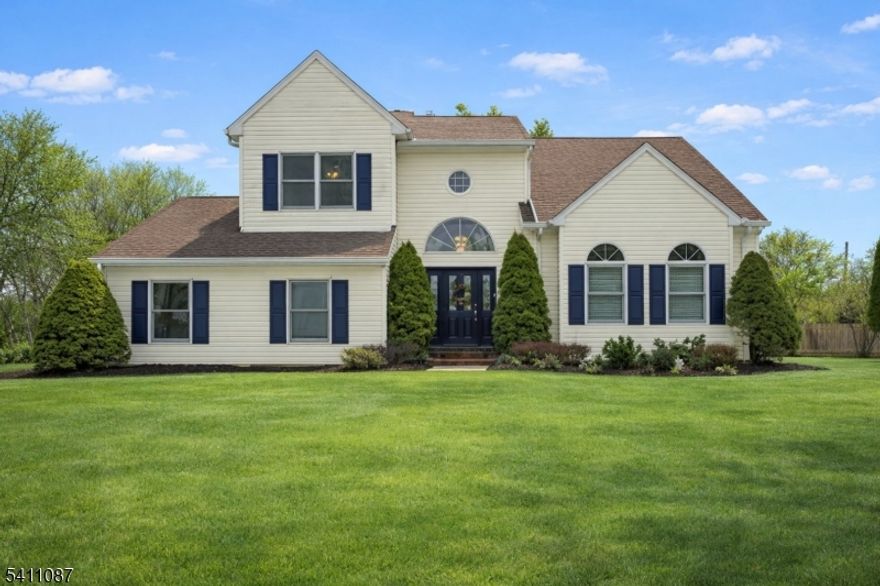 Welcome to this beautifully maintained center hall Colonial, ideally situated on a spacious corner lot in a quiet, desirable Roxbury Township neighborhood. Built Solid in 1992 and thoughtfully renovated in 2015, this four-bedroom, two-and-a-half-bath home offers a timeless layout paired with modern updates and finishes.Hardwood floors flow throughout the home, enhancing the bright and spacious floor plan. The updated eat-in kitchen features granite countertops, stainless steel appliances, and ample cabinetry, opening seamlessly to the main living areas ideal for both everyday living and entertaining. The home offers generous room sizes and a well-designed layout that provides comfort, functionality, and flexibility.Additional highlights include a two-car garage, a full finished basement offering valuable bonus space, and a large Trex deck overlooking the backyard perfect for outdoor enjoyment. With its attractive updates, inviting spaces, and prime location, this home presents an exceptional opportunity to enjoy all that Roxbury Township has to offer.