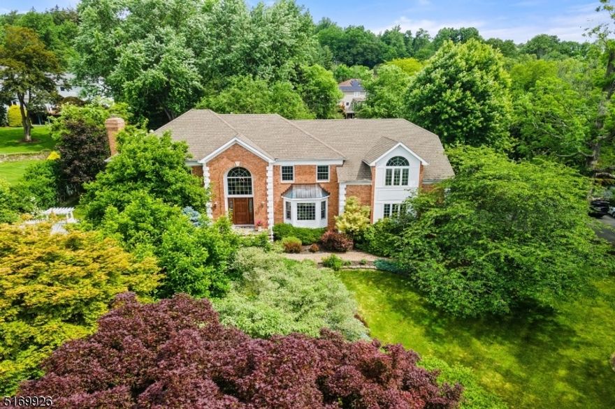 Look no further for your stunning "vacation at home" residence with fabulous 1.6 Acre of private property complete with spa-like, in-ground, heated swimming pool oasis, including patio, cabana and outdoor kitchen.  This beautiful home features gleaming wood floors, an abundance of light, lovely two-tone, eat-in kitchen with center island, stainless steel appliances & marble countertops, 5 bedrooms (one on the first floor with full bathroom close by - could be Office/Den) and large, finished basement including Rec Room, Home Theater, bonus 4th full Bath & extra room for Study use etc.  The spacious Primary Bedroom features a balcony, imitation fireplace, extra sitting/exercise area with office nook.  Located close to all local amenities, schools, recreational facilities and an excellent network of roads to New York City, Newark Liberty International Airport, The Jersey Shore, Philadelphia, Boston & Washington, D.C. this home checks all the boxes.  Fireplaces, chimneys, flues, hot tub (drained) conveyed "as is" with no known issues.