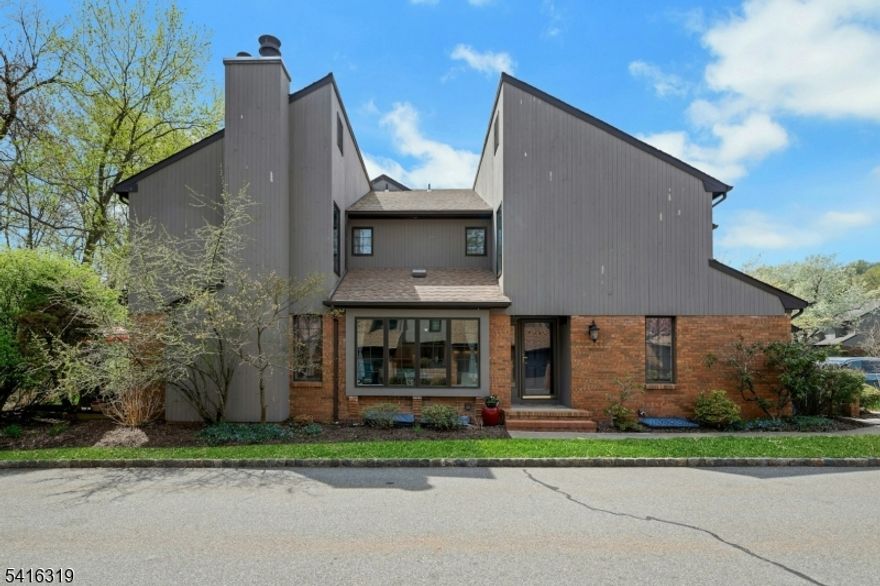 The absolute best location in Spring Brook Townhome Community this End unit enjoys both Golf Course views plus privacy located at the end of Keats Way. The eastern and south exposure make for a light and bright unit year round. Enjoy the carefree living of a townhome with the feeling of a single family home.  Updated and upgraded throughout this home boasts a custom chef's kitchen with generous cabinets and  extra granite counter space.  Hardwood floors thruout with parquet in the step down living room that has a fireplace and a wall of glass with sliders out to the patio overlooking the golf course. The patio just outside the living  room offers a quiet, private place for relaxation. The Dining room is open with large picture window allowing for lots of light and large table for guests.The first floor den/office has built in bookcases for easy organization. Powder room boasts new pedestal sink, toliet and mirror. The finished basement is crafted with the highest quality of materials,custom cabinets and features a wet bar with wine fridge, A true party room!  Second fl. has huge primary bedroom  that enjoys great views of the golf course and has it own deck to watch the sunrise. 2 additonal bedrms.+bath This community of 82 homes is known for it's  idyllic setting,friendly neighbors and ideal location with just a 1 mile stroll or 5 minute drive to Morristown's vibrant center with train station, restaurants for every palette and unique shops. No Dogs allowed. Well managed HOA!