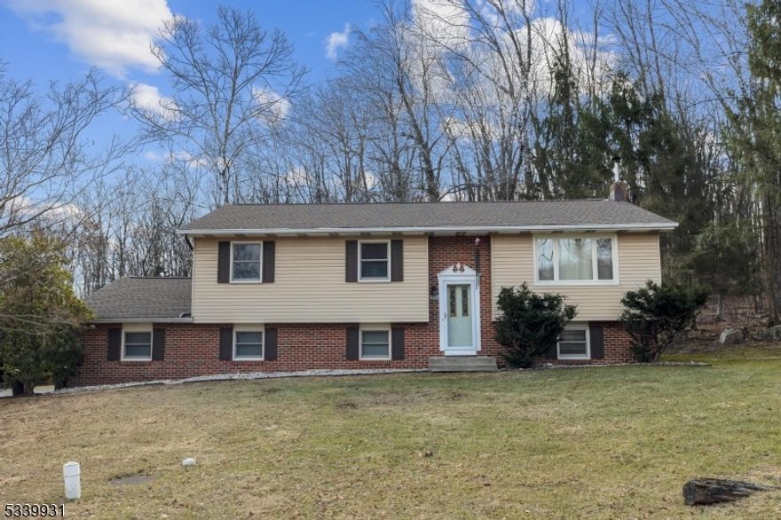 Beautifully maintained expanded bilevel on gorgeous lot has so much to offer with fully finished lower level featuring bedroom or office, updated full bath, family room with wood stove, recessed lighting, LVP flooring, newer blinds, oversized 2 car garage, large mudroom/laundry room and sliders to patio. Second floor offers open floor plan with kitchen, dining room and living room open for entertaining, granite kitchen with pantry, updated main bath and 2 spacious bedrooms. Other highlights include whole house fan, Anderson thermal windows, roof new in 2023, newer water heater, split air conditioning units, shed, driveway sealed 2024, usable property and more!Generator and lawnmower included.