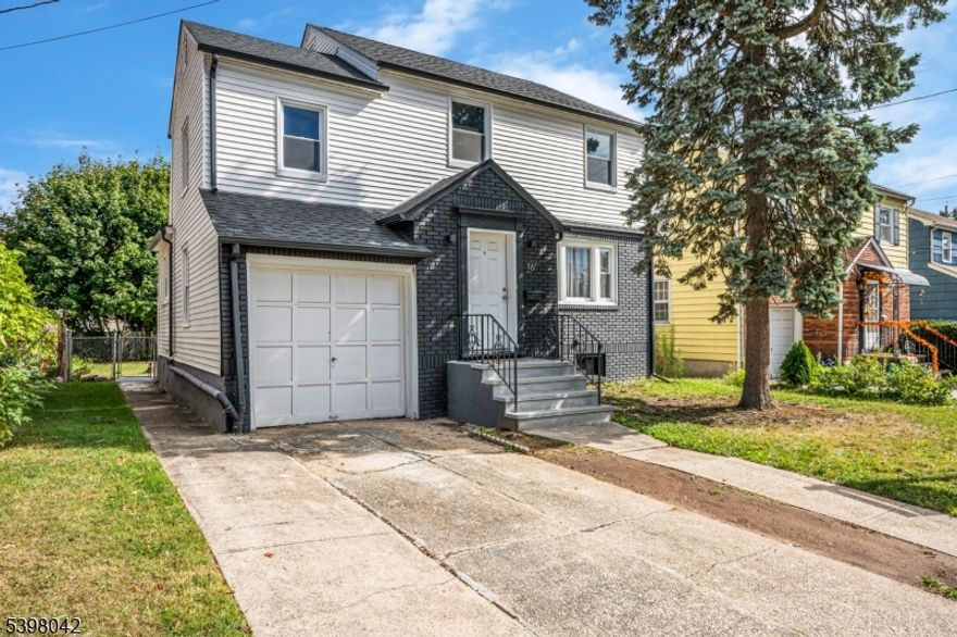 Welcome to this beautifully updated 4-bedroom home, where modern elegance meets comfortable living. Situated on a quiet street, this residence showcases a stylish exterior Upon entering, you'll be greeted by a foyer and living room with natural light pouring in through the windows. The floor plan has defined rooms but feels open. It seamlessly connects the main living areas, creating a sense of flow and versatility. The living room is a sophisticated space. Adjacent to the living room is a well-appointed dining area, perfect for hosting gatherings or entertaining guests. Off the dining room is a den that can be an office or toy area. The kitchen boast stainless steel appliances, sleek quartz countertops, and ample storage space. With its modern cabinetry, subway tile backsplash, Quartz countertop and designer fixtures, this kitchen is as beautiful as it is functional. Throughout the home, you'll find updated finishes, including hardwood flooring, lighting, new double pain windows, new roof and more. Enjoy the comforts of central air and forced hot air. Conveniently located near schools, parks, and shopping centers, this updated 4-bedroom home offers the perfect combination of modern living and timeless charm. The basement offers additional space. There is a walkup finished attic