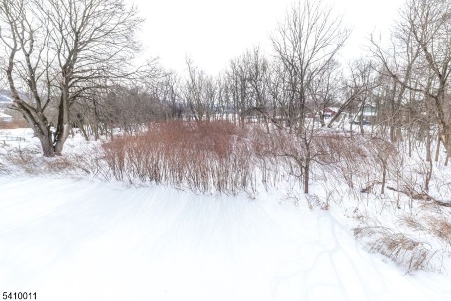 Heavily travelled Route 57 offers maximum exposure for your ideas of development. Public water and natural gas are in the street. Almost TWO ACRES of commercially zoned land! Adjoining parcel is also for sale which expands options. See MLS #4008630