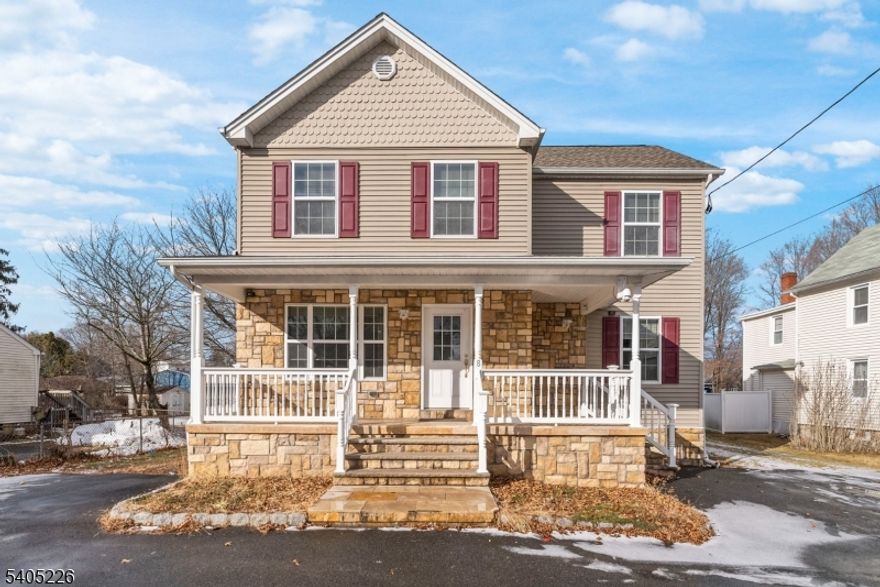 Built in 2010, this approximately 3,200-square-foot custom Craftsman-inspired Colonial, including a partially finished basement, blends timeless architecture with refined modern comfort. Crafted with quality materials and thoughtful detail, the home welcomes you with an open, flowing floor plan designed for effortless living and entertaining, highlighted by a striking stone fireplace and elegant crown molding throughout. Sun-filled living spaces transition seamlessly, creating the perfect backdrop for hosting, gathering, and everyday enjoyment.The home features four generously sized bedrooms, including a massive primary suite with a spa-like bathroom, offering a private retreat within the home. Most bedrooms feature walk-in closets, providing exceptional space and storage throughout. The partially finished basement offers flexible additional living space while maintaining ample storage. Step outside to a rear deck overlooking a spacious backyard with a storage shed perfect for outdoor dining, recreation, or relaxing at home. Public water, gas, and sewer complete this exceptional offering in desirable Succasunna.