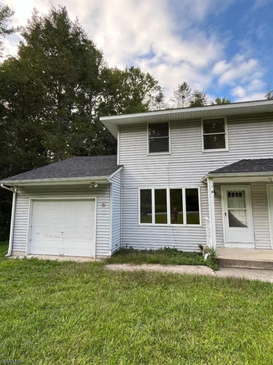 Looking for a serene location to Call home? This unit has everything you're looking for - open layout, large eat-in kitchen, private back yard, attached garage, hardwood floors, a full bath on every floor, and access to amenities that High Point Country Club has to offer. Bring your pets!