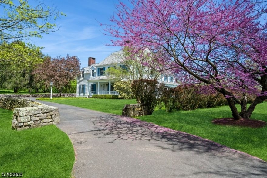 Discover the charm of this custom-built 4-bedroom gentleman's farm designed by architects Halsey & Ryder in 1983.  Featuring 4 fireplaces, Anderson windows, and brass fixtures by Ball & Ball, this home offers timeless craftsmanship and attention to detail.  Hardwood floors, a copper sink in the den bar, and hand-hewn beams add character, while the renovated kitchen blends modern amenities with historic charm.  Enjoy indoor-outdoor living with an all-season porch leading to a terrace for entertaining.  The property's stone features, sourced from a nearby quarry, create a cohesive and picturesque setting.  The 1986 oak beam barn with a slate roof offers ample storage for a car collection or farm equipment, with steel-reinforced beams ensuring durability.  Surrounded by preserved farmland and open space, these 9 acres are farmed annually for farmland assessment, adding to the property's allure.  A tree-lined driveway, mature gardens, and stone walls enhance the beauty of this estate.  Additionally, a two-bedroom cottage provides a perfect space for guests or to rent.  Don't miss the opportunity to own this unique property, where history meets modern luxury in a tranquil countryside setting.