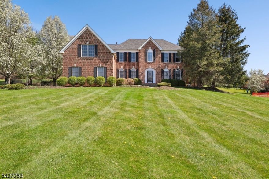 FULLY FURNISHED   Valley Greene Estates   Franklin Township, Asbury NJ   Stunning Brick Front Center Hall Colonial in one of Franklin Township's most sought-after neighborhoods. 4 bedrooms, 2.5 baths, 3-car garage   sold completely furnished. Move right in!   Soaring 2-story foyer with cathedral ceilings sets the tone. French doors open to a first-floor guest room or private home office   easily used as a 5th bedroom. To the right, the bright living room offers beautiful wide outdoor views. Flow naturally into the elegant formal dining room with lovely backyard views, then into the oversized kitchen featuring a center island, stone countertops, stainless steel appliances, and a generous eat-in area. The journey ends in the expansive family room with soaring high ceilings   the perfect gathering space. Step outside to a fully fenced backyard with patio, storage shed, and vegetable garden.    Upstairs offers an extra-large bonus family room, a luxurious primary suite with double-sink en-suite bath and walk-in closets, plus three generously sized bedrooms.   Fully finished basement with high ceilings and wet bar   an entertainer's dream.   Updates: newer roof, water heater and AC (2021). Minutes to Route 78, top-rated Somerset County schools, shopping and dining.   Fully furnished. Truly turnkey. Schedule your showing today!
