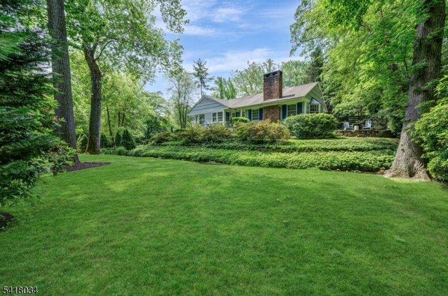 BEAUTIFULLY UPDATED 4 BED/3.1 BATH CAPE COD/RANCH IS HIDDEN RETREAT IN HEART OF MILLBURN! The best of both worlds is waiting for you at 272 Glen Ave. w/ the most charming & serene setting complete w/ a babbling brook & footbridge right out of a Monet painting. The fenced-in side & back yard is an oasis w/ gorgeous shade trees & gardens, multiple patios, a pergola, twinkling lights, a hot tub & large Trex deck. A secret paradise that's perfectly located near downtown Millburn w/ midtown direct train, Paper Mill Playhouse & highly ranked schools just blocks away. Right across the street from South Mountain Reservation- perfect for all of your outdoor activities! Inside, you'll feel instantly at home w/ thoughtful updates & a wonderful flow that includes Primary Ensuite & second Bedroom on the 1st Level. Hardwood floors throughout, multiple bay windows to soak in nature's views, trendy light fixtures, cozy gas fireplace, bright Sun Room off amazing backyard & upgraded Kitchen & Baths set the perfect ambiance for easy & enjoyable living. Home chefs will delight in spacious Kitchen with professional SS appliances, large peninsula & open access to the bright & welcoming Dining Room. Upstairs feels like a charming Cape w/ 2 Bedrooms sharing a Full Bath, walk-in closets & a secret bonus room perfect for a playroom, office or workout space! Lower Level is fully furnished w/ Rec Room, Laundry Room & newer Half Bath, access to an oversized 2-car Attached Garage. New HVAC 2025.