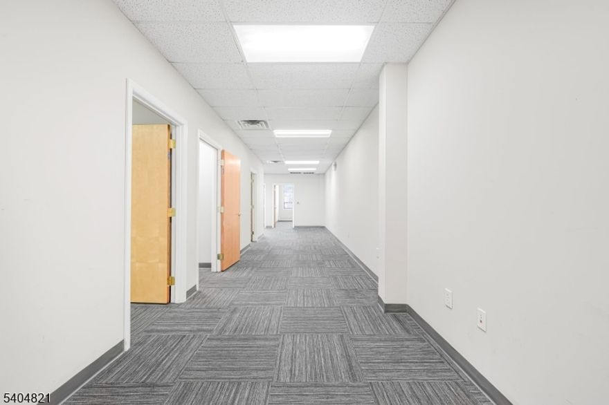 1,285 sqft second-floor suite-ideal for chiropractors, physical therapists, or professional offices. Features four private offices and a flexible layout designed for productivity and client-focused services. Located in the prominently positioned One Lethbridge Plaza, a refreshed professional hub with modern common areas and a polished atmosphere. Exceptional visibility on Route 17 with easy access to Route 287 and the NYS Thruway. Modified gross lease. $2624/mo + CAM ($237/mo). Utilities included in base rent. 3+ yr term.