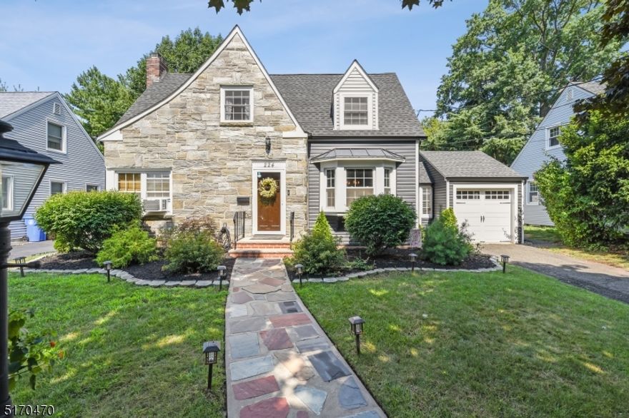 #BACKYARDGOALS. Welcome Home sweet home. This magnificent tudor nestled in the heart of the extremely sought after Sunny Side neighborhood, features a fully renovated kitchen with new stainless steel appliances and granite counter tops, sunken oversized living room with charming fireplace and built in shelving, and bright formal dining room with bay window, perfect for holiday. The mudroom off the 1 car garage is convenient storage, with room for all your shoes and coats. Upstairs you will find 3 bedrooms and a gorgeously renovated bathroom with separate tub and oversized shower. The basement is semi finished with powder room, which makes a great additional living space and den. Outside this home is an entertainers paradise, with brand new patio, gazebo, and built in fire pit. This fully fenced in yard with low maintenance vinyl fencing provides tons of privacy. New gutters, siding, and upstairs windows were installed in 2020. Magazine worthy Decor & finishes, with gleaming hardwood floors throughout. Nothing to do but unpack and throw backyard BBQ! Close to major highways, transportation, restaurants, and shopping. Do not come to the home or knock on the door without a confirmed showing.