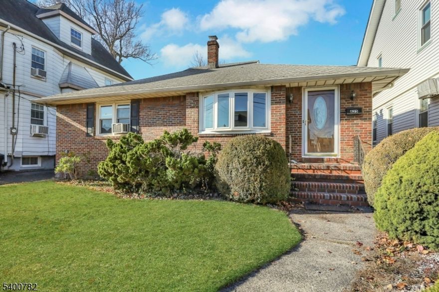 Charming brick home featuring 2 spacious bedrooms and 1.5 baths with beautiful hardwood floors throughout. Enjoy the convenience of a detached garage plus ample additional parking. The large finished basement offers endless potential and is ready for a new owner's vision and personal touch. A solid home with great space, character, and opportunity to make it your own. HOME IS BEING SOLD AS IS!