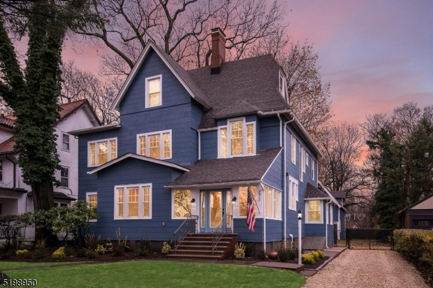 Elegant Victorian located on prestigious Ridgewood Avenue has been completely restored & renovated! This grand home is a just a 5 min walk to town center, NYC train, bus & all schools. The enclosed porch/mudroom features custom cabinetry & leads to the gracious foyer which offers a fireplace & stained glass window. Three archways & soaring ceiling heights between 9.5 ft & 10.5 ft allow light to pour into the open concept main floor, which includes a spacious living rm, formal dining rm, gourmet EI kitchen with leisure space, family rm/office & powder rm. Designed for entertaining, the main space flows into a deep yard with oversized deck. The kitchen's focal point is a copper hood & features a center island with breakfast bar, Viking app's & quartz counters. The luxurious primary suite includes 2 lg closets, bath w/ soaking tub, WI shower & double sink vanity. Five add'l bedrms & 2 add'l full baths complete the 2nd & 3rd flrs. With over 4000 s/f including the finished basement, the rooms are especially generous throughout. New windows, roof on house & garage, furnace, multi-zone cooling/heating, beautiful HW floors & original Details throughout. The basement includes a lg rec rm, exercise space plus a powder rm & storage. The deep property provides a great canvas for creating a custom backyard with potential for a pool, lush gardens, etc. Carriage house has 3 car garage & loft -- could become a pool house, a game room, art studio, office. Love life in charming Glen Ridge!