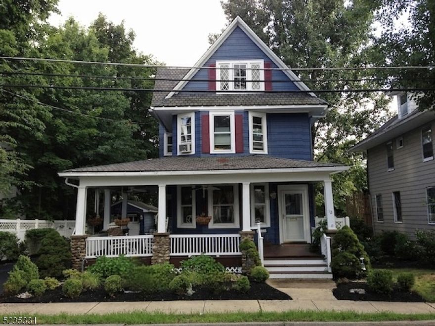 Charm and Convenience in this updated Colonial /Victorian style home with much potential!  Home boasts a wrap-around front porch for those warm summer evenings, high ceilings, wood floors, coffered ceilings, and a detached 1-car garage. Extremely desirable Morris Plains location on a one way street, and just blocks away from shopping, dining, and NJ Transit direct train to NYC, along Rt. 202 and 24, with schools, parks, highways and more all in close proximity.