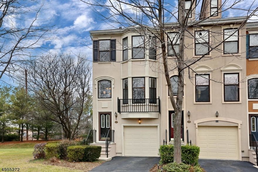 This tri level END unit luxury townhome, set on a quiet cul de sac with a spacious yard, offers an exceptional blend of modern design and thoughtful renovations throughout. The main level features a formal dining room with stunning custom woodwork, a beautifully updated kitchen with rich wood cabinetry, granite countertops, and abundant cabinet and storage space, plus a bright, sun filled living room with a cozy gas fireplace. A convenient powder room completes this level. Upstairs, the expansive primary suite includes two closets and a private primary bath. The second bedroom is generously sized with two closets and direct access to the second full bath. A conveniently located laundry area adds ease to everyday living. The lower level provides a large, flexible space ideal for a bedroom, home office, or both, along with a third full bath, direct garage access, and walk out access to a private patio and impressive yard perfect for entertaining or relaxing. End units rarely become available and this prime location makes it even more special!