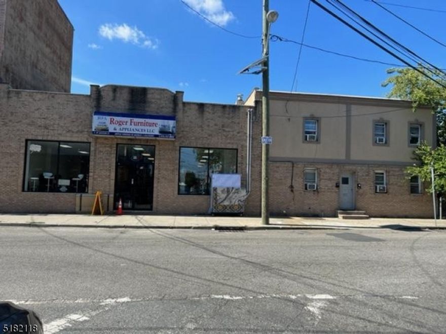 Store front good for retail or professional use with 2 fam home and lot across st known as 2 Clover st 25x100  Block 1999 Lot29 with 11 parking spots.SOLD AS A PACKAGE. 2 Fam comps at $400 k + lot at 325K + and commercial space of 4,873 sq ft at about $300 PSF.Opportunity for redevelopment. Residential tenants month to month. Store needs 3+ months to relocate.Store $4000 Apts $1200 and $1180 Parking $1400 . Taxes $15,250 for all.  Located on a very busy and visible location.