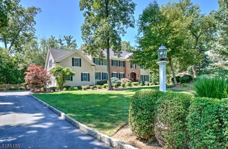 Welcome to this lavish home steeped in luxury. This classic beauty is tucked away on a quiet cul-de-sac in a neighborhood with 7 stately homes, close to schools, recreation, highways, and trains to NYC. The elegant entry hall greets guests with warmth. The living room is an elegant setting for both formal and informal entertaining. The dining room is perfect for candlelight evenings. The family room with gas fireplace is a cheerful center for everyday living. In addition to the open kitchen, the home also has another full kitchen located in the basement. The primary bedroom is adjoined by a luxurious newly renovated bath with soaking tub, steam shower, and dual vanities. there are an additional four bedrooms on the second floor and an additional bedroom/office on the first floor. The lower level was designed with distinction and includes a full kitchen, full bath with marble and a steam shower media room, gym, and temperature controlled wine cellar. The exterior is a private oasis with artistically designed lush landscaping.  A large Trex deck with new motorized awnings, extensive outdoor kitchen, saltwater, jetted dipping pool that can go up to 104 degrees and a blue stone patio with wood burning fireplace. Full house generator and underground sprinkler system. Sonos wireless sound system in backyard and basement. A fabulous home for entertaining for all seasons!Relocation company will credit up to $7,500 towards closing cost!!