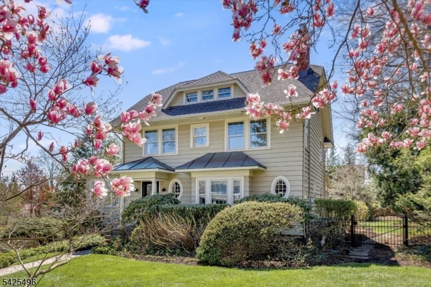 Elegance, history, and thoughtful design converge in this one-of-a-kind Maplewood treasure uniquely conceived by Edward C. Balch, the visionary developer known as the "Father of Maplewood." This lovingly curated 4-bedroom, 3.5-bath Center Hall Colonial has been beautifully updated while honoring its remarkable origins, showcasing exquisite millwork and moldings, gleaming hardwood floors, and an alluring screened-in back porch. Perfectly suited for entertaining, the eat-in kitchen features honed quartzite countertops and stainless steel appliances, all within a layout that flows effortlessly from room to room. The second floor is anchored by a gracious primary suite featuring a generous walk-in closet - easily converted back to a fifth bedroom - plus a beautifully updated primary bath with stunning tile work. Two additional bedrooms and a full bath complete this floor. The third floor is a retreat unto itself, with a spacious bedroom, full bath, and expansive lounge area bathed in natural light. The lower level features a dedicated gym, craft room, and generous storage, with endless potential for a media room. French drains and sump pumps offer added peace of mind. All of this, just two blocks from vibrant Maplewood Village with celebrated cafes, restaurants, boutique shops, and a direct NJ Transit train to NYC.