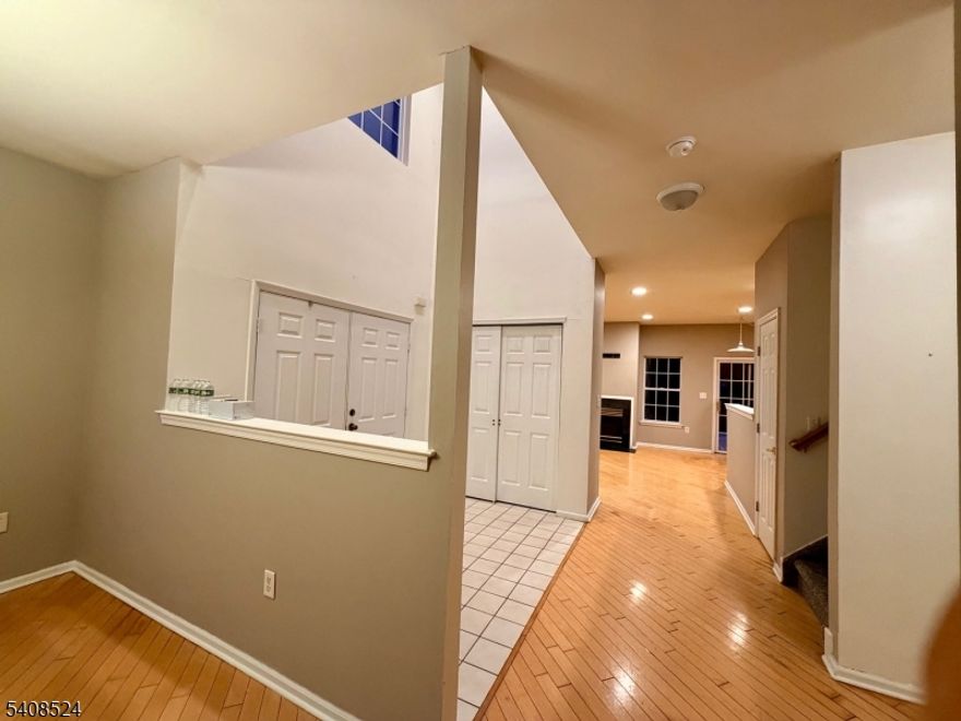 Spacious & Bright 3-Bedroom TownHome with Modern Features! Welcome to this newer 3-bedroom residence featuring 9' ceilings and an inviting two-story entry that greets you upon arrival. Enjoy an open, light-filled kitchen with sliding doors to a private patio overlooking serene wooded views perfect for morning coffee or outdoor entertaining. The family room boasts ReFinished oak floors and a cozy gas fireplace, ideal for year-round relaxation. The expansive primary suite includes a walk-in closet and a luxurious ensuite with both a soaking tub and separate shower. A large second-floor laundry room adds convenience to this thoughtfully designed layout. All rooms are generously sized, offering comfortable everyday living and with New Carpet. Close to shopping, bus and train access, and major routes including 23, 46, 80 & 287 for easy commuting.