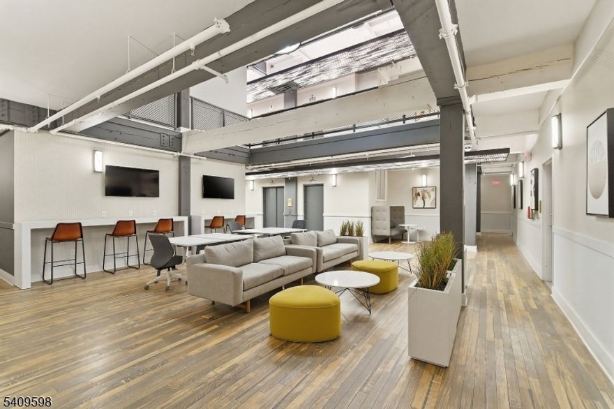This 1BR/1BA home sits inside a beautifully restored historic factory, giving you modern comfort with real character. High ceilings, oversized windows, and incredible natural light make the space feel open and inviting. The kitchen features stainless appliances.The building offers a lifestyle that is hard to match. Residents enjoy complimentary Coffee Bar, coworking lounge, 3 fitness centers. There is a controlled access parking garage with optional assigned parking for an added fee, bike racks with a repair station, and car charging stations coming soon.Step outside to a landscaped courtyard with BBQ grills and an outdoor theater for movie nights and gatherings. Benefit from an on site after school Boys and Girls Club along with popular STEAM programs during the school year and summer. Complimentary WiFi is available throughout the community.You are 4 min away from Light Rail, minutes from multiple CitiBike stations, and surrounded by parks, schools, and stores. Pets are welcomed with a dedicated dog walk.All amenities are included with no additional fees. This is luxury living inside a piece of history, designed for comfort, convenience, and community.