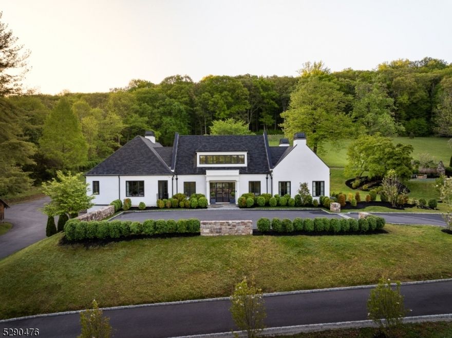 First time on the market ! Introducing an unparalleled gated oasis nestled atop the rolling Somerset Hills: your dream home awaits! Perched majestically on over 10 acres of pristine landscape, this custom-built masterpiece commands attention from every angle. With over 7,700 sq. ft. on three levels of meticulously crafted living space, and a luxurious pool house, this estate offers the ultimate in refined living. Step inside and be greeted by a symphony of elegance and comfort, where every detail has been thoughtfully curated to perfection. The heart of this home is the custom gourmet kitchen with top-of-the-line appliances and designer finishes. Natural light pours in through expansive windows, casting a warm glow upon the spacious living areas, creating an inviting atmosphere for gatherings large and small. Retreat to the tranquility of the first-floor primary bedroom suite, a sanctuary of serenity boasting panoramic views of the surrounding hills. With four bedrooms and six and a half baths, there's ample space for family and guests to unwind in style. Outside, an oasis awaits, with lush landscaping, sprawling lawns, a outdoor cooking area, and a sparkling pool beckoning you to relax and recharge. Whether you're entertaining al fresco or simply soaking in the breathtaking vistas, every moment spent in this idyllic setting is pure bliss. Escape the ordinary and embrace the extraordinary lifestyle that awaits in this unparalleled estate.