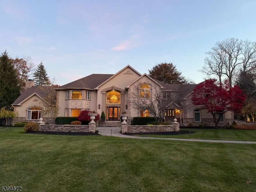 Welcome to Antlers Ridge Estates!  Where luxury, design and lifestyle converge.  Experience the art of living in this custom-built masterpiece, crafted with precision and passion. Every inch of this home has been curated with an unwavering attention to detail, a timeless floor plan reimagined with elevated finishes and endless possibilities for any style of living.  Step outside and prepare to be amazed. Your private resort awaits - three levels of bluestone patios and terraces designed for seamless entertaining.  A heated pool with cascading waterfall, jacuzzi spa, firepit, outdoor kitchen and BBQ area all surrounded by lush, professionally landscaped grounds on over five pristine acres, complete with a state-of-the-art lighting and sound system. This isn?t just a home - it?s a lifestyle statement. Perfectly positioned close to downtown, top-rated schools, and commuter routes, this property delivers the ultimate blend of privacy and convenience.  Luxury, Location, Lifestyle - You?ve arrived and welcome home to Antler Ridge Estates.