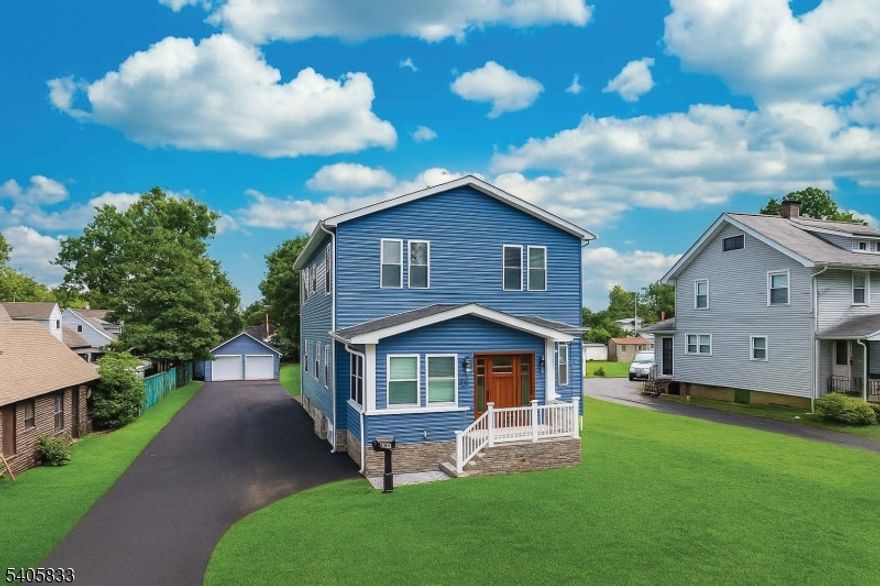 Welcome to a fully transformed, custom 4-bed, 3.5-bath Center Hall Colonial at 423 New Market Rd. This turnkey dream home features a new second-floor addition and top-to-bottom renovation, blending modern luxury with timeless charm. Enter from the enclosed patio to  gleaming hardwood floors, designer light fixtures, and abundant natural light. A gourmet chef's kitchen, complete with premium THOR stainless steel appliances and custom cabinetry. Living and dining spaces flow effortlessly for entertaining. Laundry room with custom cabinetry and Maytag washer and dryer, a small office and a 1/2 bathroom on the main level. Four bedrooms, including two with en-suite bathrooms and ample closets. A Finished walkout basement offers flexible space for a media room, gym, or playroom. Enjoy the rear deck.High-end upgrades include: a detached 2-car garage with new doors and smart openers, dual-zone HVAC, new roof, windows, doors, siding, gutters, and electrical panel and Ring security are included. An expanded driveway fits 10-12 cars.Located just minutes from Route 287, Route 28, shopping, dining, parks, schools, and public transportation. This move-in-ready Piscataway home is a rare opportunity. Schedule your showing today!