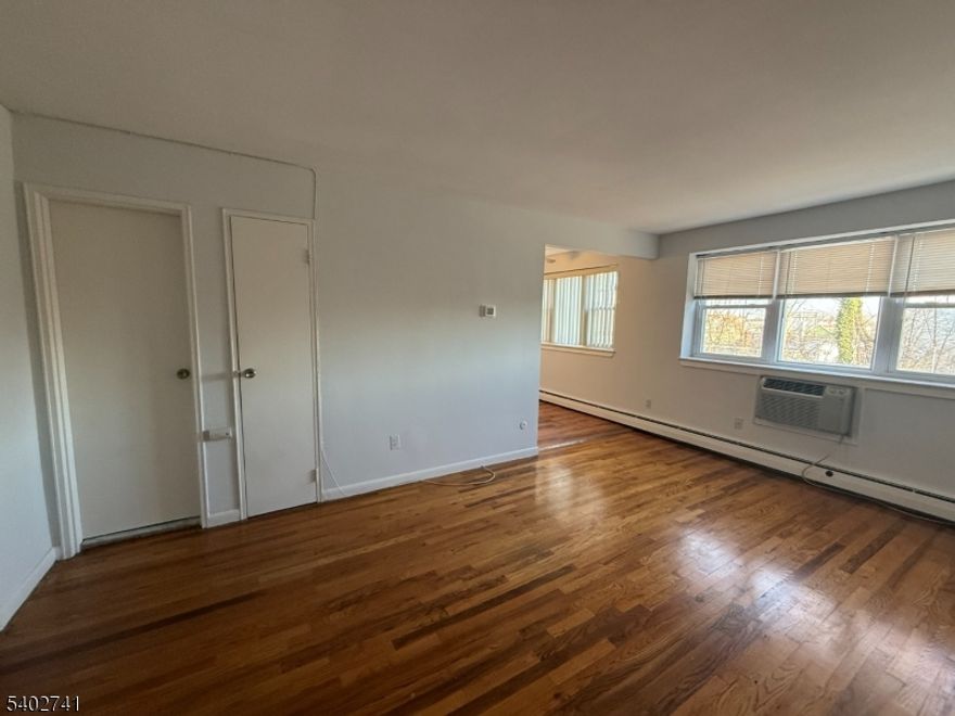 Spacious one bedroom, one bath apartment in prime location. Kitchen opens to adjacent dining area and living room. Big bedroom with 2 large closets. Updated bathroom. Tenant controls their own heat. One parking spot. Steps away from all that downtown Montclair has to offer - shopping, restaurants, Wellmont Theatre. NYC train and bus too! NO DOGS.