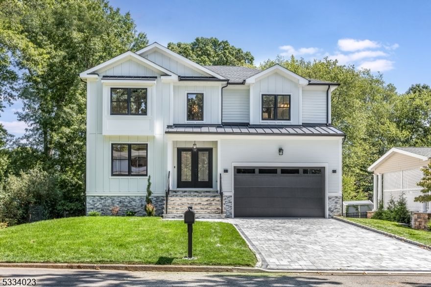 Welcome to your Dream Home! Brand new construction masterpiece on the ULTRA-DESIRABLE area of North Caldwell , featuring approx. 5,000 sqft of finished space. Custom Verticle & Horizontal Hardie Plank Siding w/Azek Trim. Stunning 2 story entry foyer w/herringbone white oak floors, Stunning custom coffered ceiling  trim work throughout the 1st level. Butler's pantry leads to dream kitchen w/ CUSTOM Cabinets , matching quartz counter tops & backsplash, walk-in pantry, white oak Custom island , breakfast area & wet bar w/sink. Fireplace w/custom trim work. Powder room Bathroom off the Garage w/ walk in coat closet. 2nd fl features Herringbone white oak floors  through out the hallway , 4 Bedrooms, primary suite bedroom w/vaulted high ceilings,  his and hers walk in closet, Stunning master bathroom w/spa bath, floor to wall ceiling tile, large walk-in shower, his and her vanity sink. Jr suite w/full bath, walk in in closet , 2 bedrooms connecting w/ jack and jill full bat. Laundry room w/sink to complete 2nd fl. Full finished basement w/ full bathroom ,walk in shower, sliding door to access the yard. 9 -10ft ceilings on 1st & 2nd level, Ring door bell camera, Central vac, Sprinklers. Oversized garage with potential to add lifts for additional space , boosting 15ft Ceilings . North Caldwell is home to Amazing schools, easy commuting, & great shopping and Restaurants. Home comes with a 10 Year Builders Warranty. Don't miss out on this stunning brand new construction home !