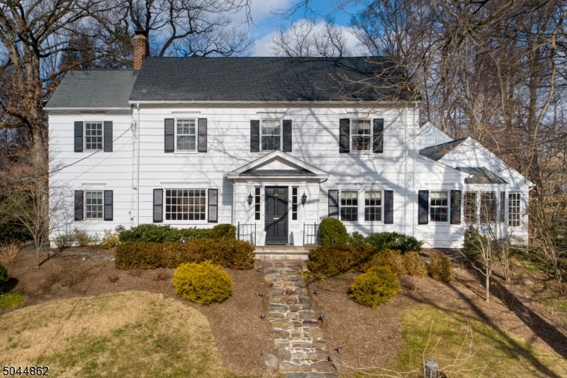 Utterly Magical Colonial in the heart of Old Short Hills in storybook setting with inground pool! Open & airy floorplan, great flow for entertaining, sundrenched & chic designer style at every turn. Secluded local by some of SH most prestigious homes, near top Glenwood Elem, NYC train. 0.7 acres of BREATHTAKING landscaped property w/dreamy private heated pool. Bright & cheery spaces for Virtual School/Work. Chef s Kitch w/crisp white cabinetry, granite countertop & Miele/Wolf/Viking appls. Magnificent Fam Rm w/vaulted ceiling & cust built-ins. Eleg Din Rm, Liv Rm & SunRm/Office. 2 fireplaces. Master Bed Ste w/Office/Sitting/Dressing Rm, cust WIC & Spa-Like Bath. Finished LL w/RecRm & Full Bath. Flex space for Guest Ste. Enchanting home w/the charm of Old Short Hills & every modern amenity at your fingertips!