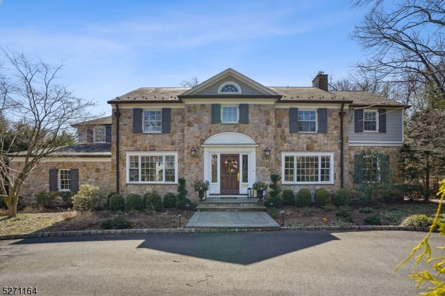 Mint condition stone front Colonial on beautiful .74 acres of totally level, park-like property with plenty of room for a pool, ideally located just 0.4 miles from Glenwood Elementary School and 0.7 miles to the train station. Every inch has been renovated by John James AIA. Gorgeous NEW huge gourmet eat-in kitchen, with top of the lines appliances, quartz countertops & backsplash, designer custom cabinetry, skylight over eating area w/ French doors to deck and gorgeous totally level backyard. The kitchen is totally open to the spectacular family room w/ stone gas fireplace and pair of French doors to the deck and backyard. A French door leads from the family room to a cherry paneled office w/ custom built-ins. A screened-in porch overlooks the gorgeous backyard. 2nd level features a spectacular primary suite w/ vaulted ceiling, gas fireplace, access to private terrace and 2 walk-in closets, a sitting room/home office, and a luxurious NEW primary bath w/ Jacuzzi & shower, convenient laundry room, plus 4 more bedrooms & 3 more full baths, 2 of which are en suite. Recreation Room / Exercise Room in the lower level w/ high ceilings. Terrific amenities including new electric, new plumbing, NEW maintenance free Hardi Plank siding, NEW video surveillance cameras, NEW deck, NEW landscaping, NEW exterior lighting, NEW blacktop on circular driveway, slate roof w/ copper leaders & gutters, hardwood floors throughout 1st & 2nd levels, Pella windows throughout, & underground sprinklers.